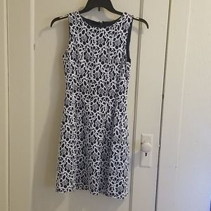 Eva Mendes blue and white lace dress.